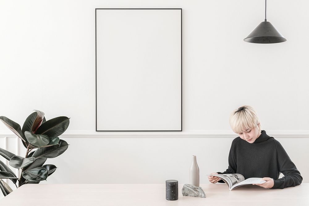 Blond-haired woman reading magazine, minimal living room interior design