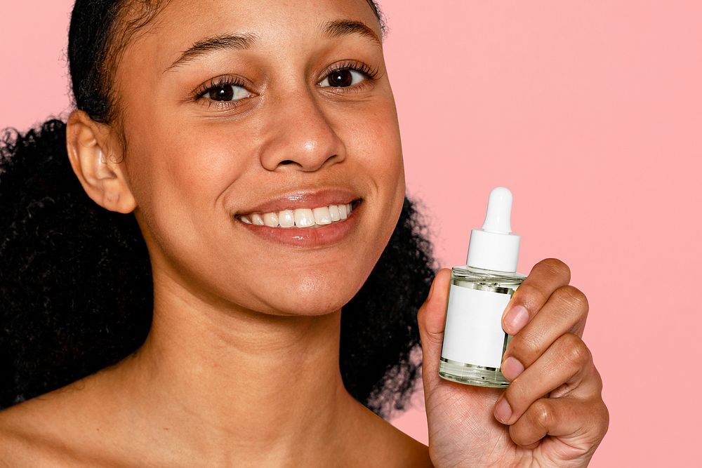 Vitamin C serum in dropper bottle, skincare product