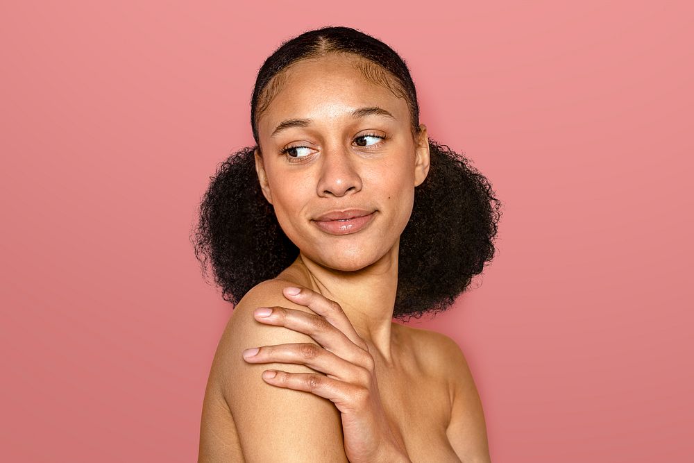 Beautiful African American woman, pink background
