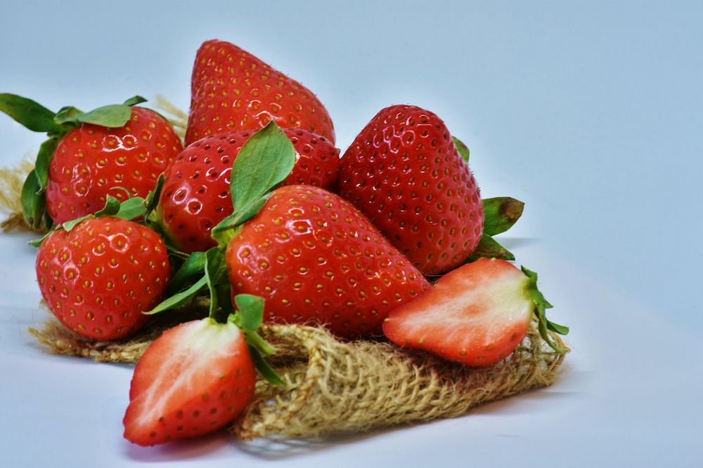 A picture of eight strawberries. Original public domain image from Wikimedia Commons