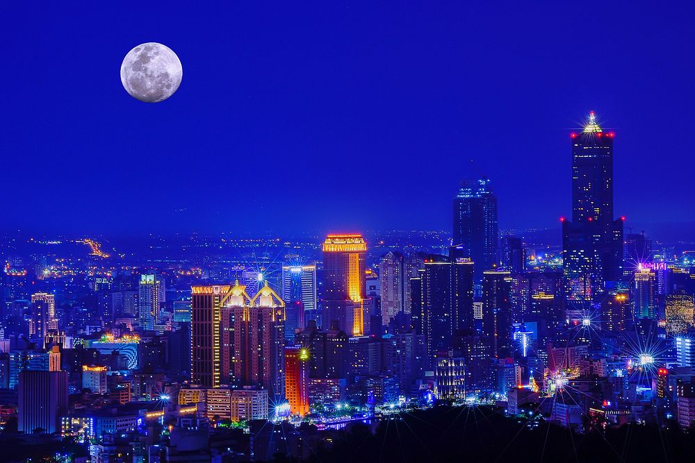 Kaohsiung, Taiwan urban skyline at night taken in 2018. Original public domain image from Wikimedia Commons