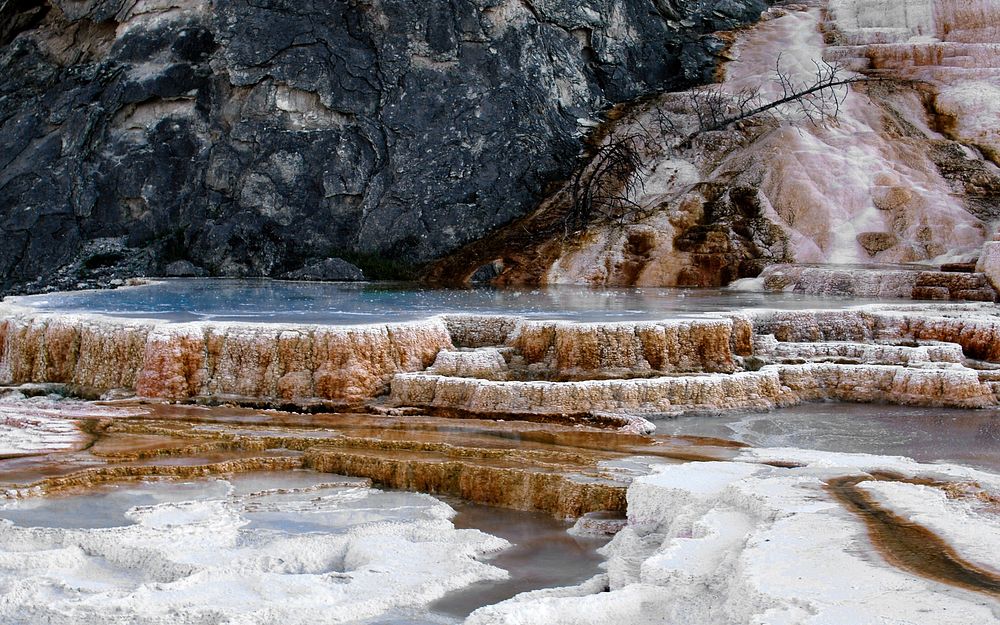 Terrace of travertine at Mammoth Hot Springs in Yellowstone National Park in Wyoming, USA. Original public domain image from…