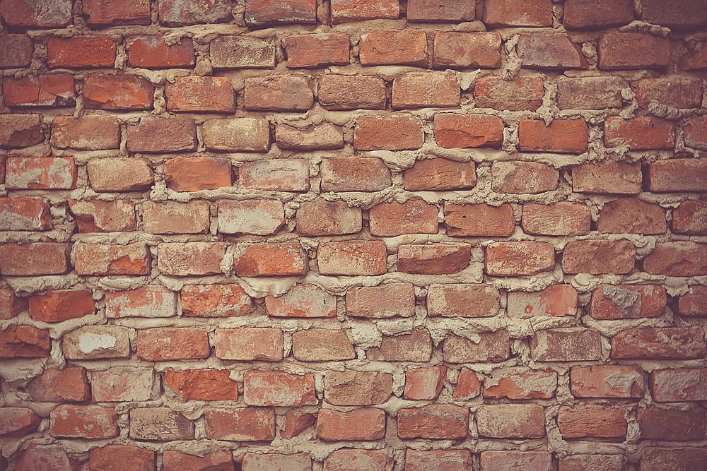 Detail of a brick wall.Esperanto: Brika muro detale.. Original public domain image from Wikimedia Commons