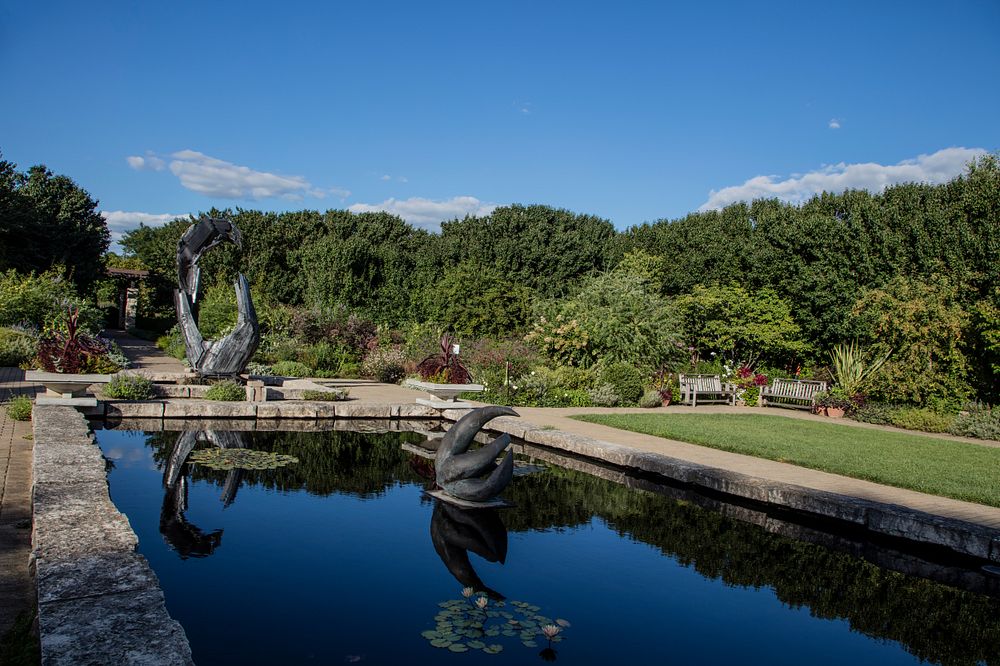 The 80-foot-long reflecting pool, designed to connect the garden thematically with nearby Lake Monona, at the Olbrich…