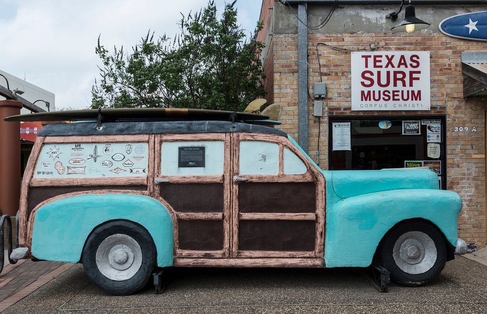 A classic “woodie” station wagon, redesigned as art, stands outside the Texas Surf Museum in Corpus Christi, Texas.