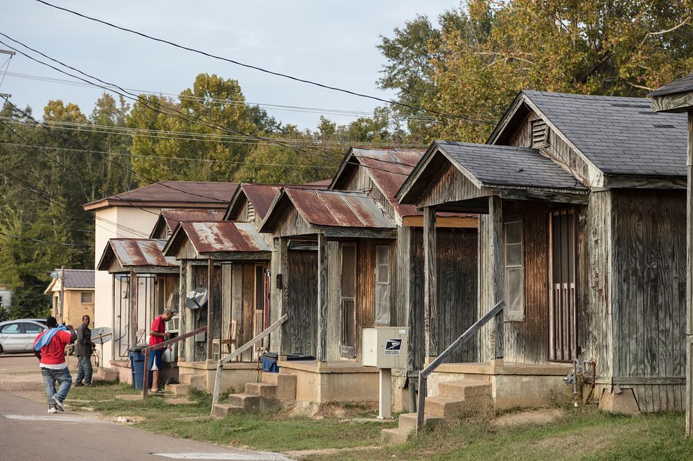This is the poor neighborhood in Grenada, Mississippi, where blues guitar legend Morris "Magic Slim" Holt, who borrowed part…
