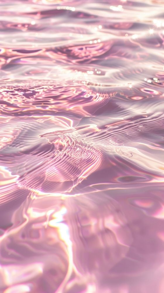 Light pink water surface ripple outdoors nature.