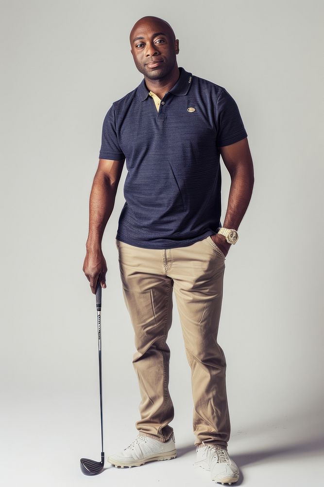 Golf player wristwatch clothing footwear.