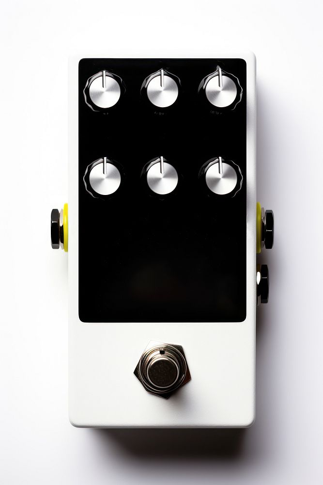 Overdrive guitar effect pedal white and black electronics switch phone.