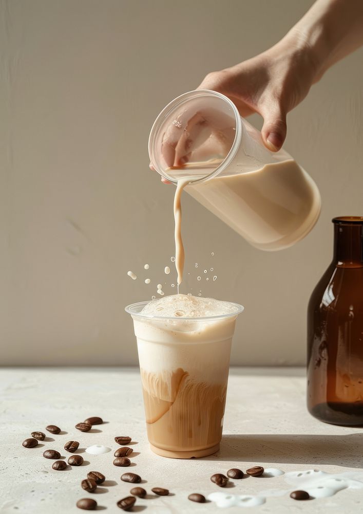 Coffee in a clear plastic cup milk beverage cooking.