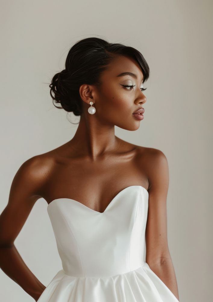 Woman in a white wedding dress shoulder photo face.