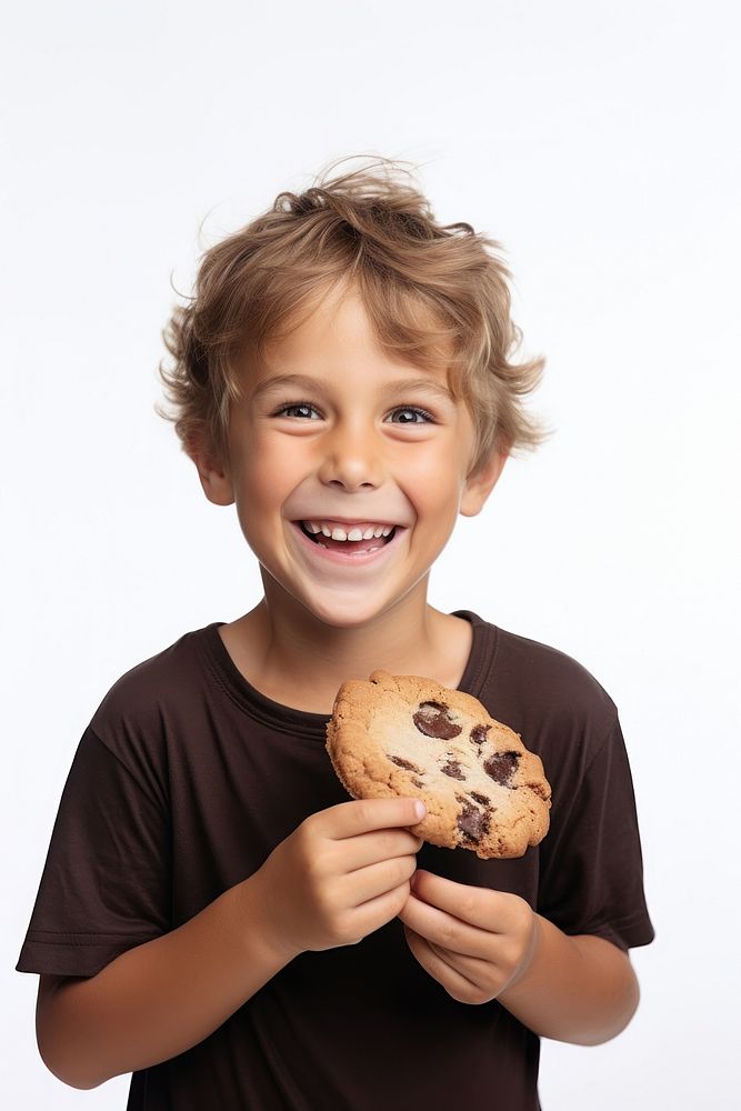 Boy eating chocolate cookie portrait photo confectionery.