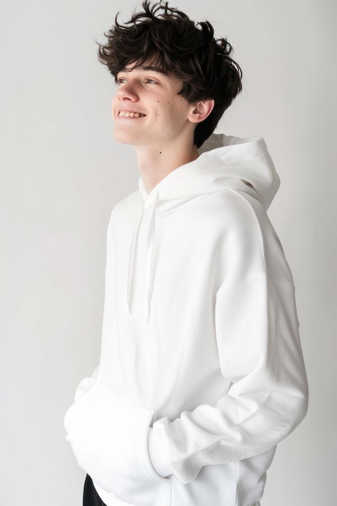 Young man wears blank white hoodie mockup photography happy face.