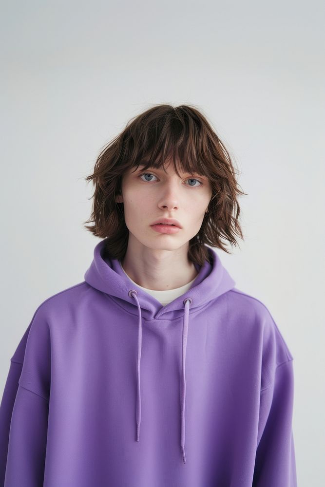 Young man wears blank purple hoodie mockup photography portrait fashion.
