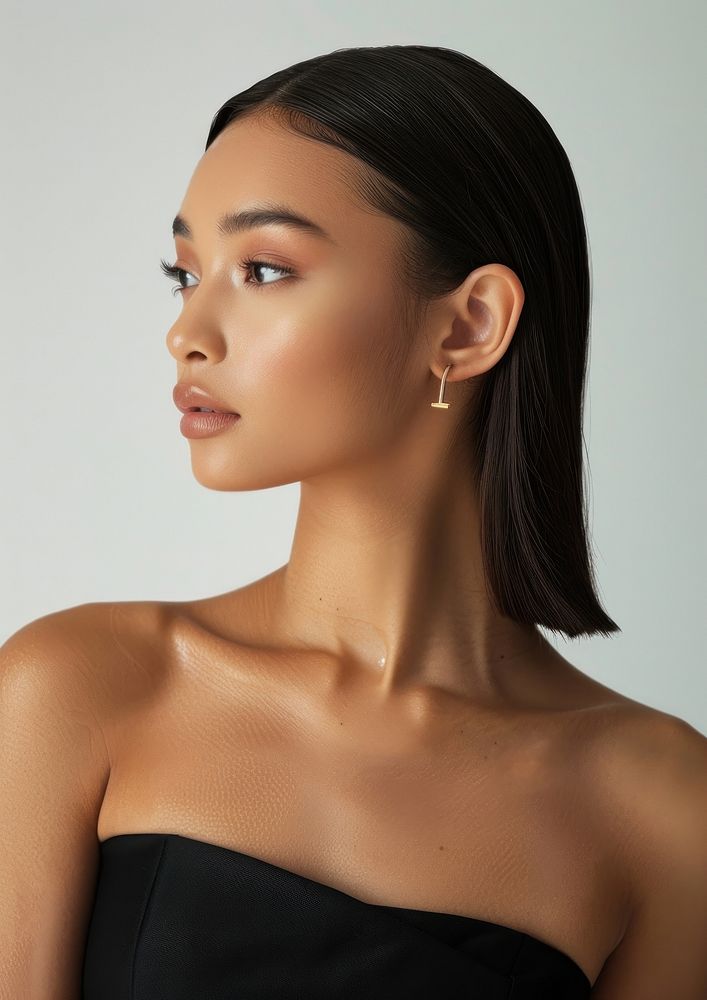 Gold earrings photography woman hair.