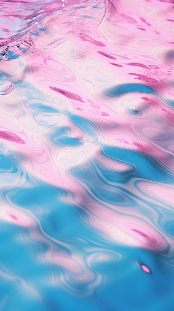 A blue background with water ripples outdoors blossom purple.