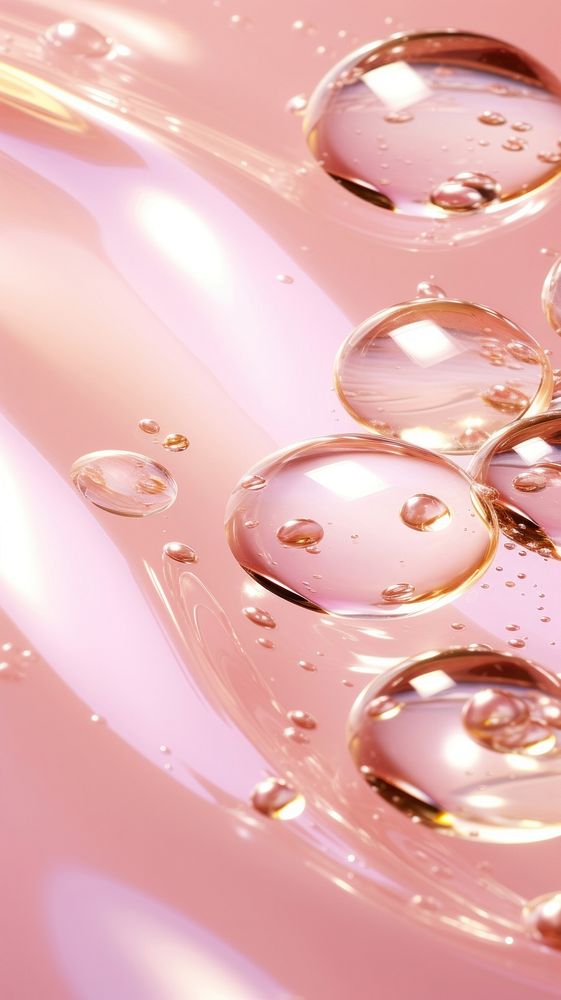 A pink background with water ripples droplet bubble.