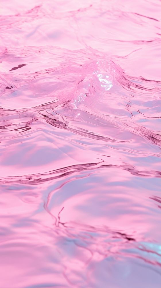 A pink background with water ripples blossom jacuzzi purple.