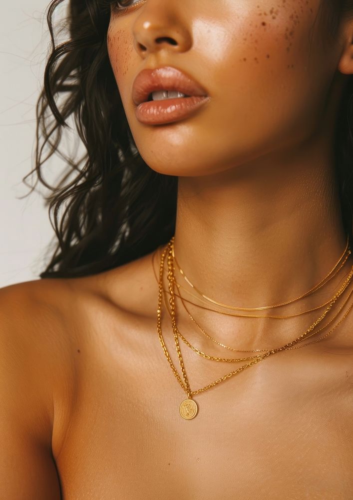 Gold necklaces woman face accessories.