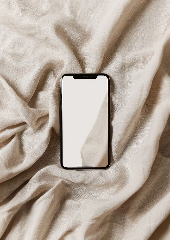A mockup of a phone electronics cushion person.
