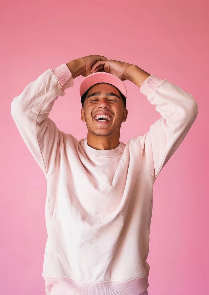 Joyful man in pink attire