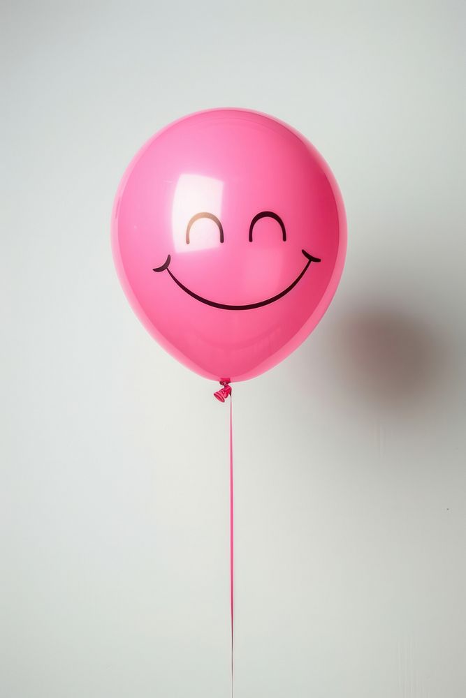 Pink balloon with winking face