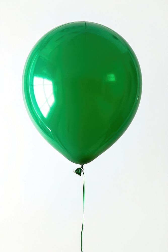 Green balloon on white background