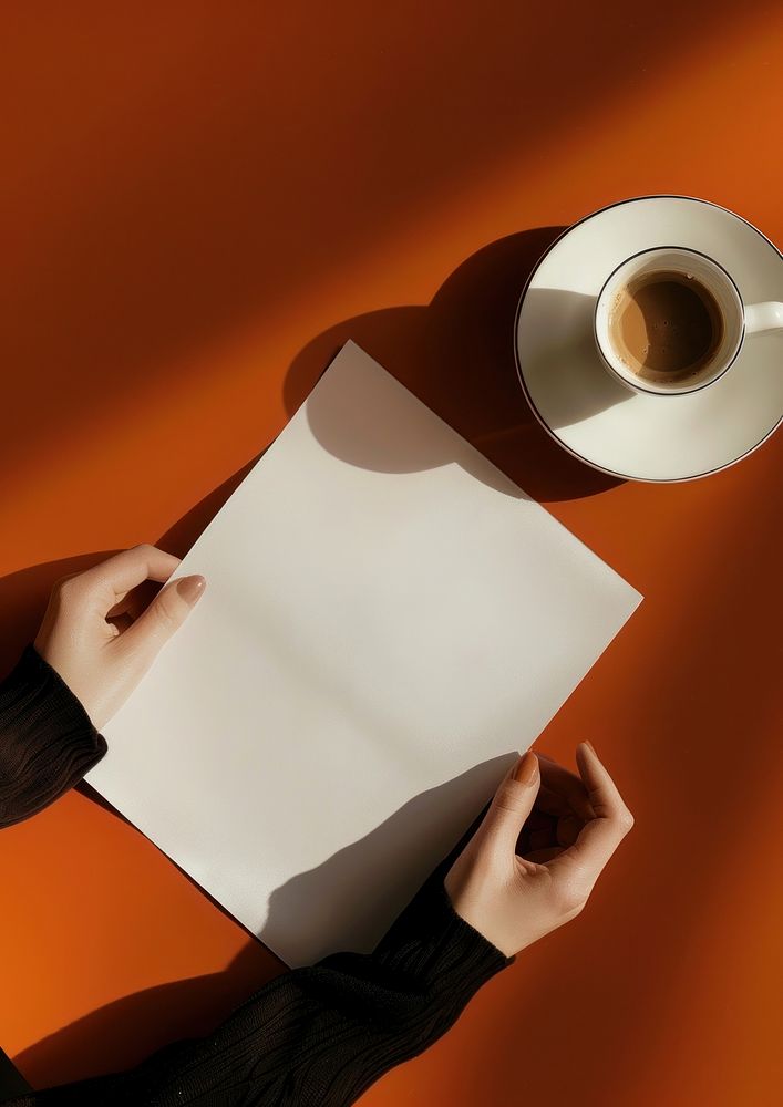 Minimalist coffee cup paper hands