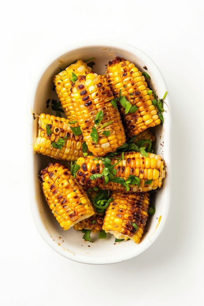 A dish of roasted corn pineapple produce grain.