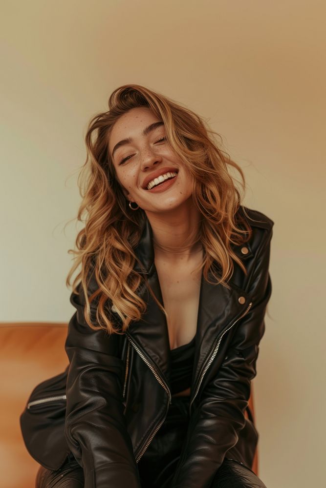 Happy woman in leather jacket