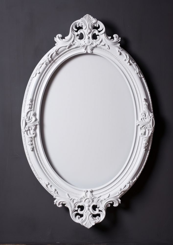 Elegant ornate white oval mirror