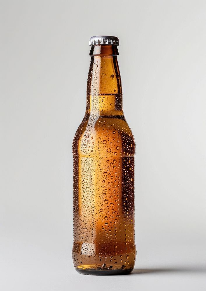 Chilled amber beer bottle isolated.