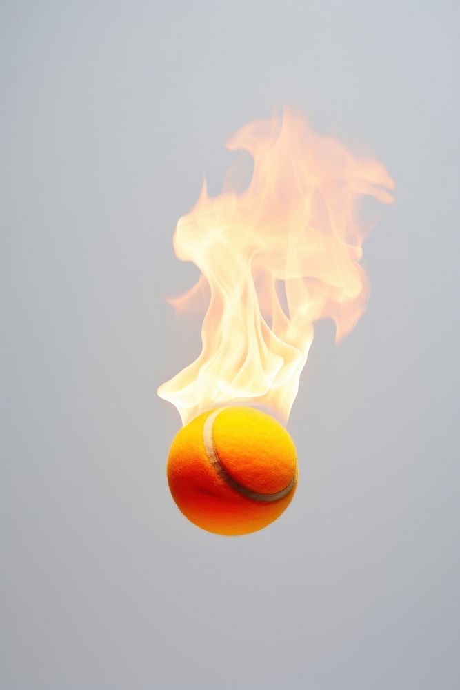 Tennis ball fire burning sports.