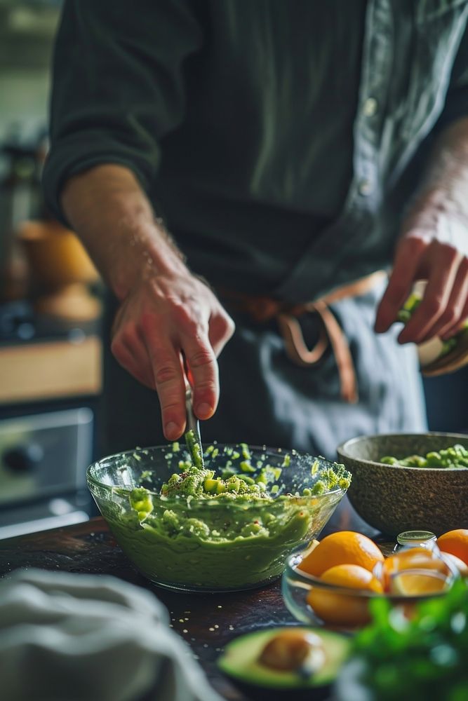 Guacamole kitchen cooking adult. AI generated Image by rawpixel.