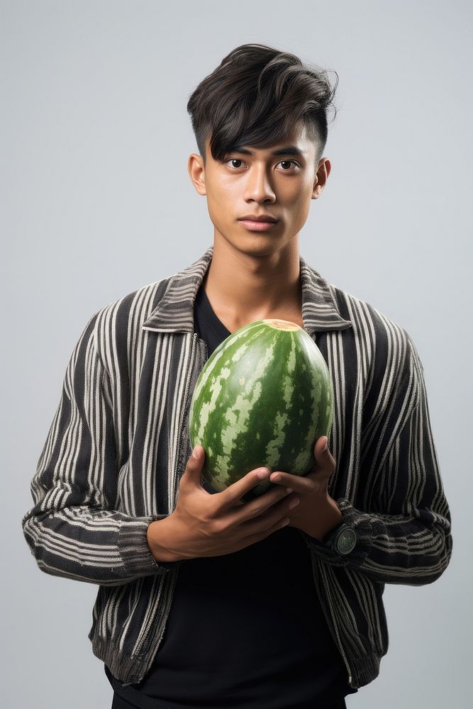 Thai man melon watermelon holding.