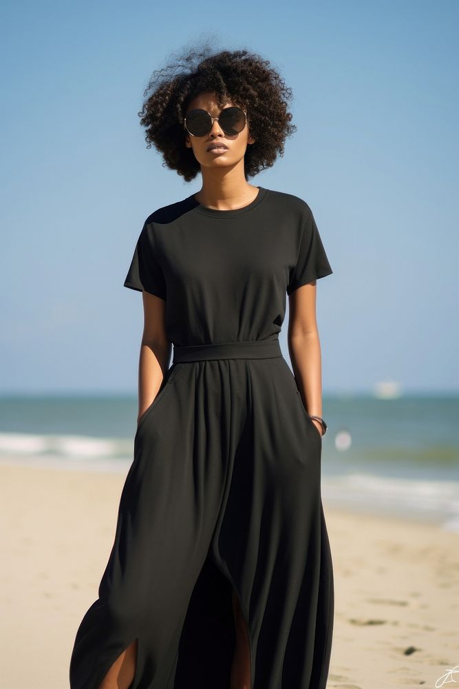 Black woman wear minimal beach fashionable portrait sleeve dress.