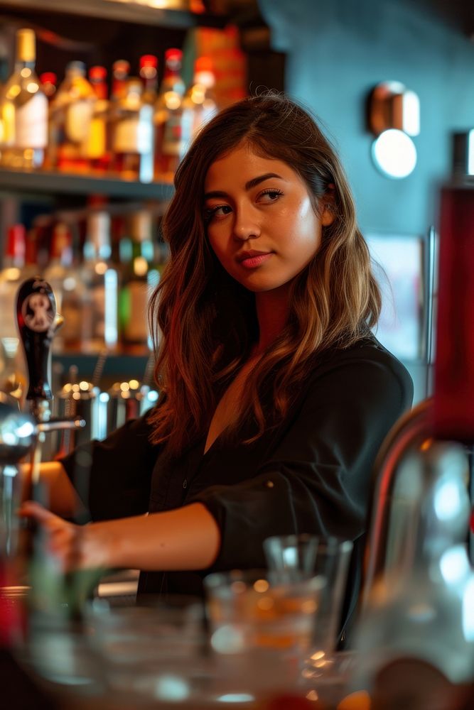 Female multi ethnic bartender at work adult drink refreshment.