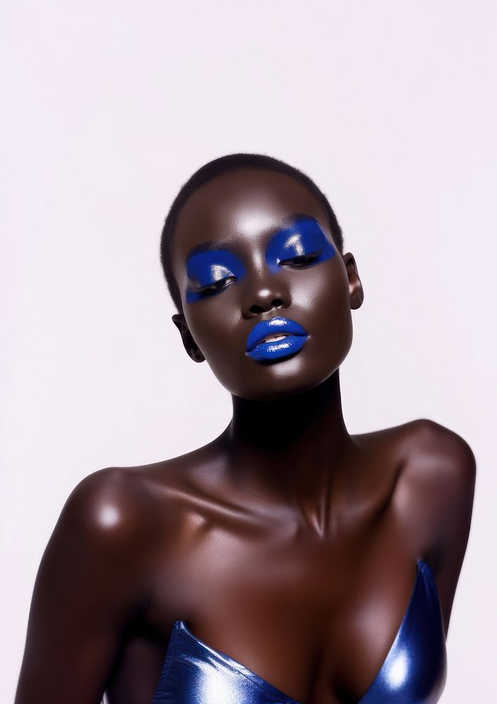 A black teenage woman with modern navy makeup photography portrait fashion.