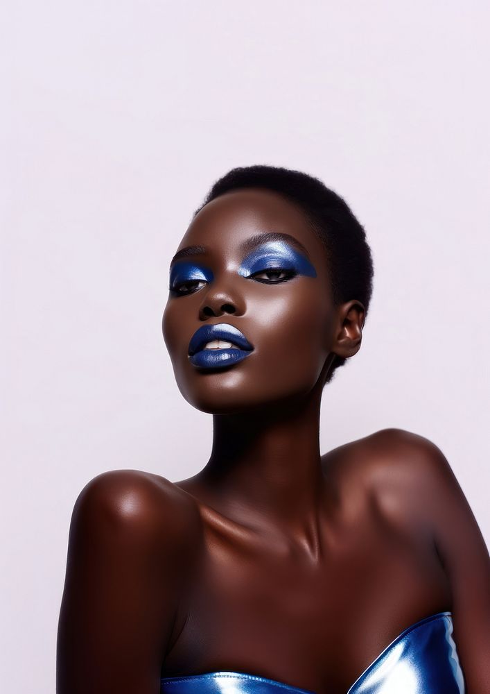 A black teenage woman with modern navy makeup photography portrait fashion.