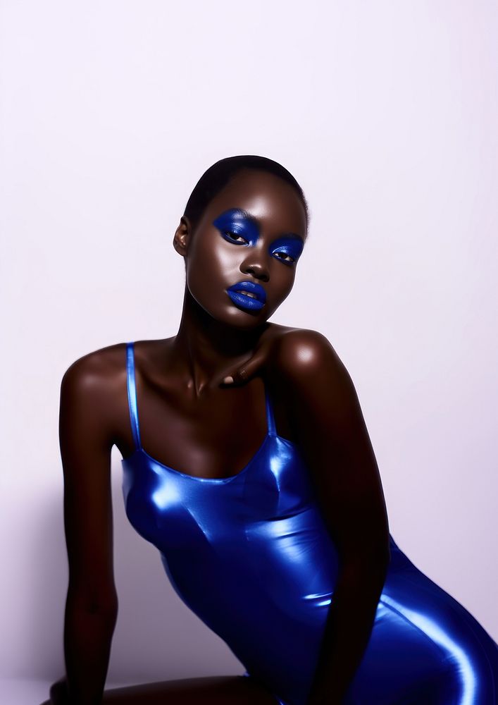 A black teenage woman with navy makeup photography portrait fashion.