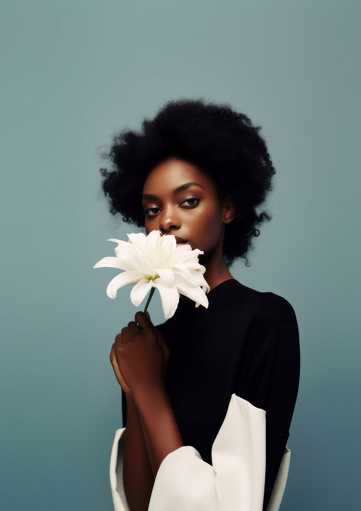 A black woman portrait with a white flower photography fashion adult.