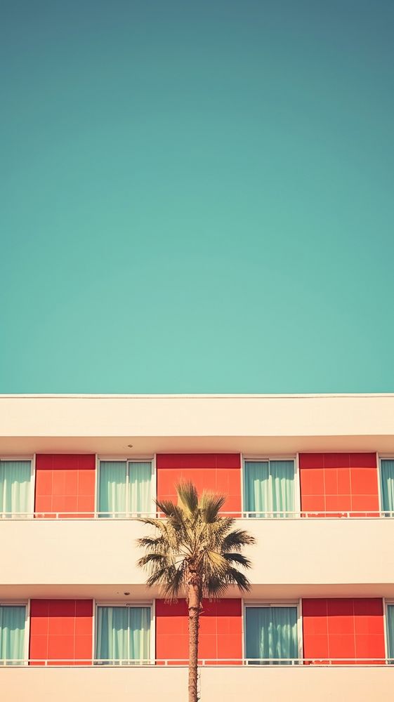 Retro photography of a hotel architecture building outdoors.