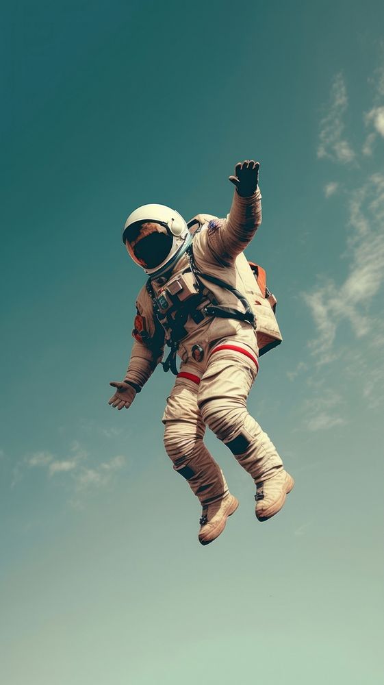 Retro photography of an astronaut adventure parachuting protection.