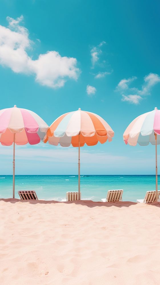  Beach umbrellas in beach outdoors horizon summer. AI generated Image by rawpixel.