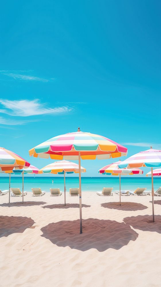  Beach umbrellas in beach summer outdoors horizon. AI generated Image by rawpixel.