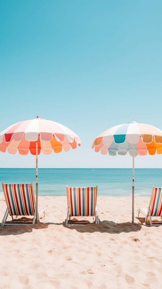  Beach umbrellas in beach furniture outdoors horizon. AI generated Image by rawpixel.
