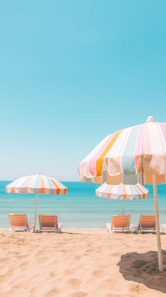  Beach umbrellas in beach outdoors vacation horizon. AI generated Image by rawpixel.