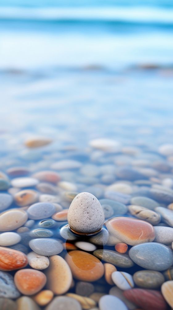 Pebble on the beach pebble outdoors pill.