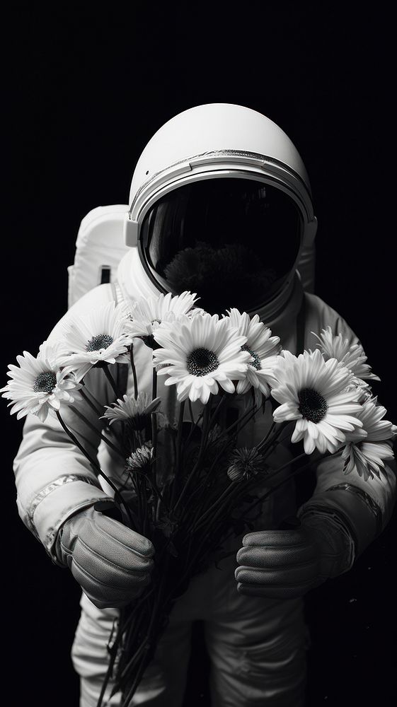 Photography of astronaut holidng flowers photography petal white.