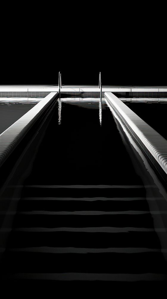 Photography of swimming pool architecture staircase railing.